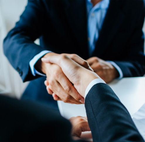 partnership-two-business-people-shaking-1